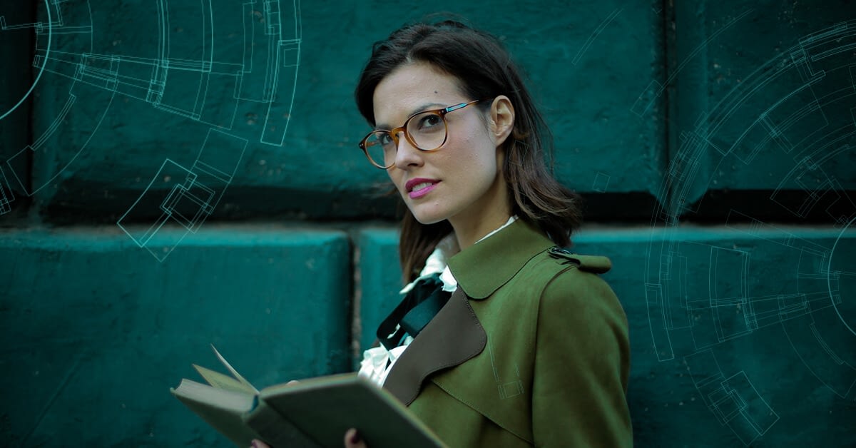 woman with glasses holding a book, wondering about intelligence amplification