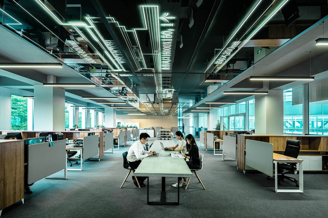 employees in a large office space